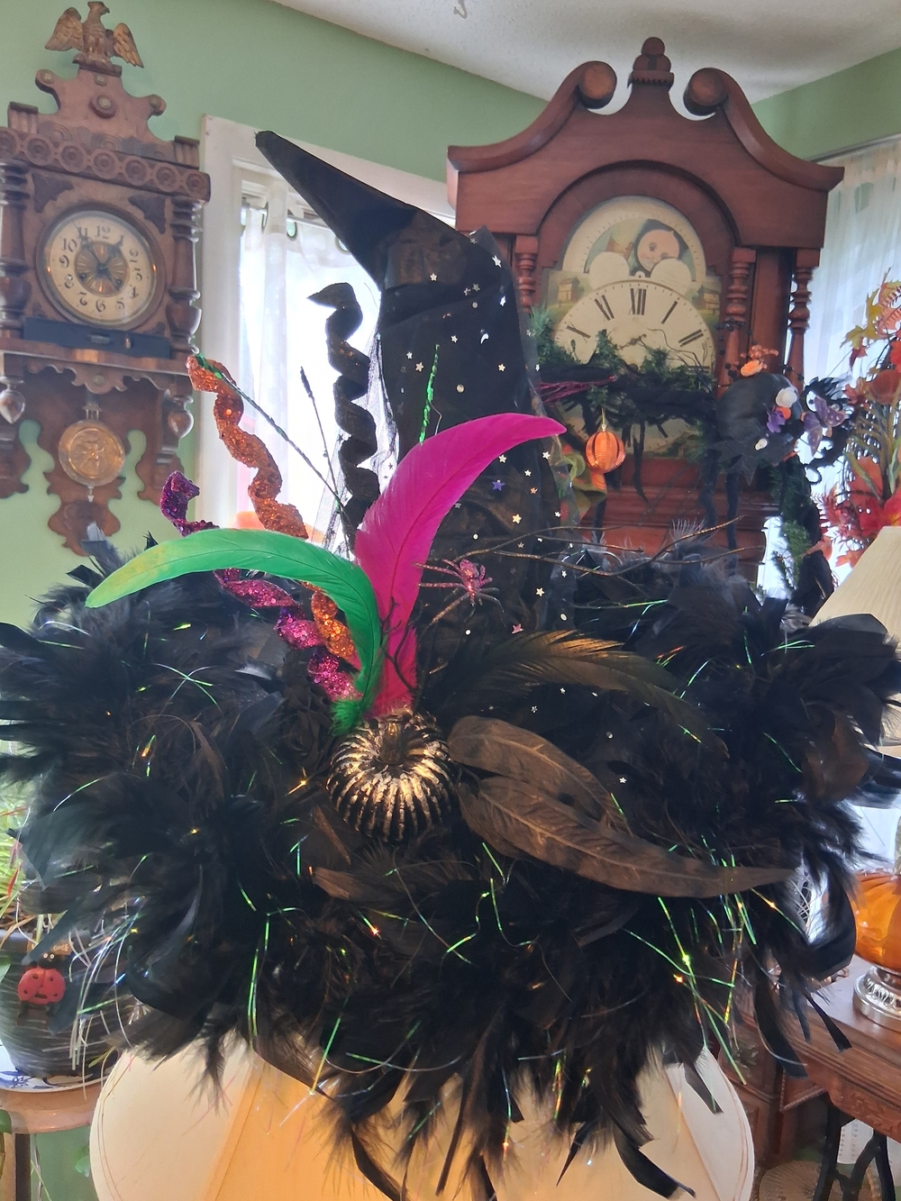 Witch Hat Party Decoration with Black Feathers and Bright Accent Feathers